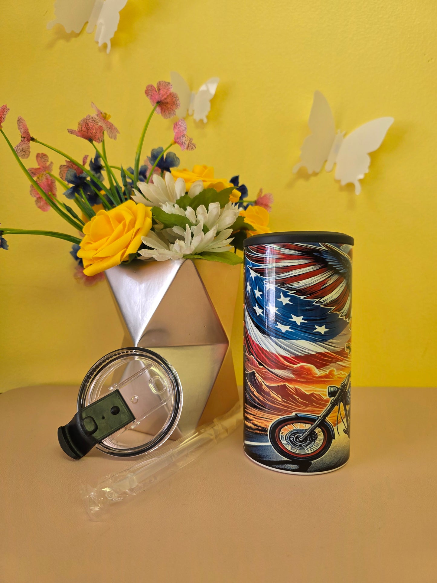 Insulated 4‑in‑1 stainless steel tumbler with American flag and motorcycle wheel artwork, shown with lid, and straw