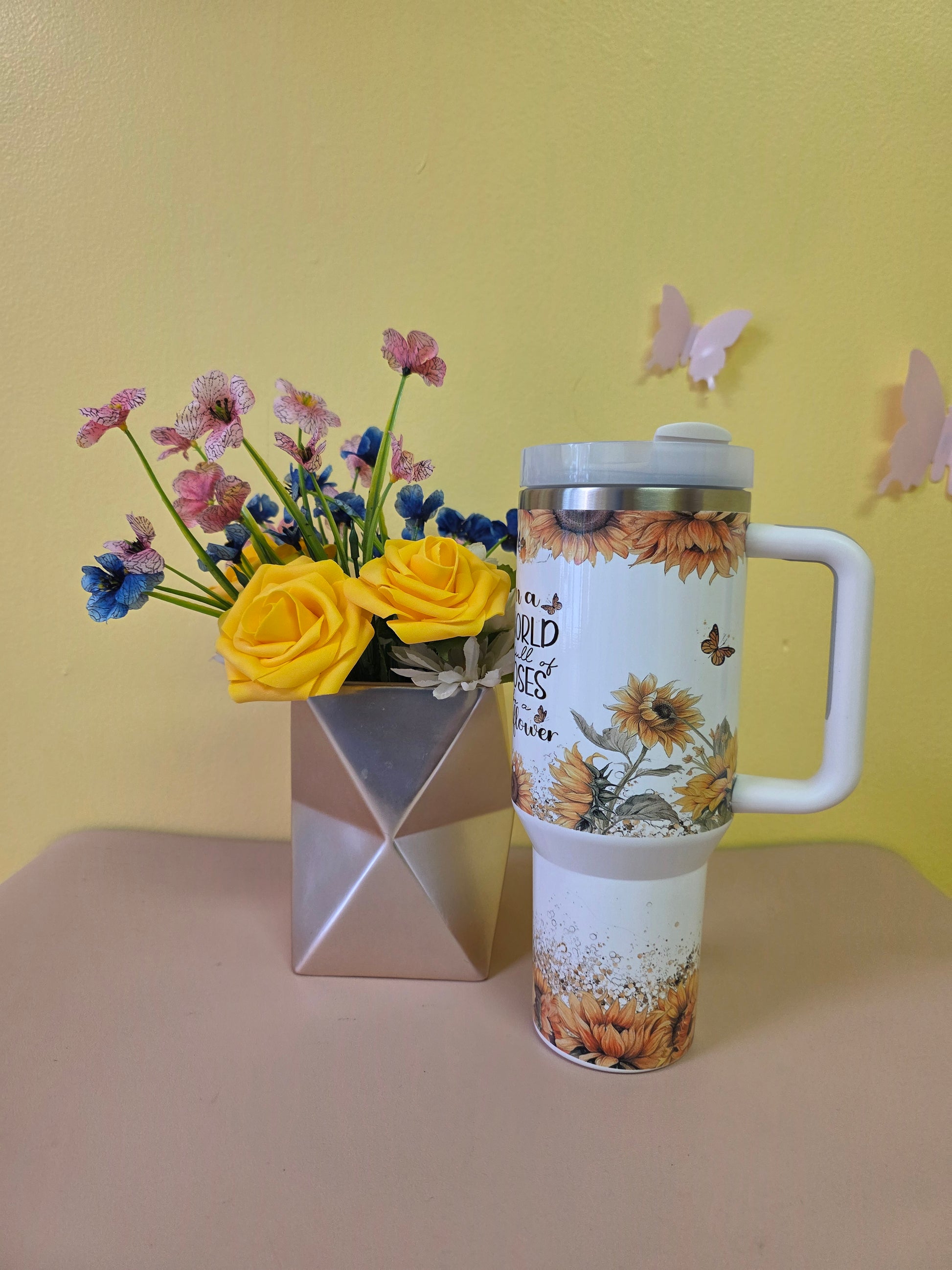 In a world of roses be a sunflower tumbler