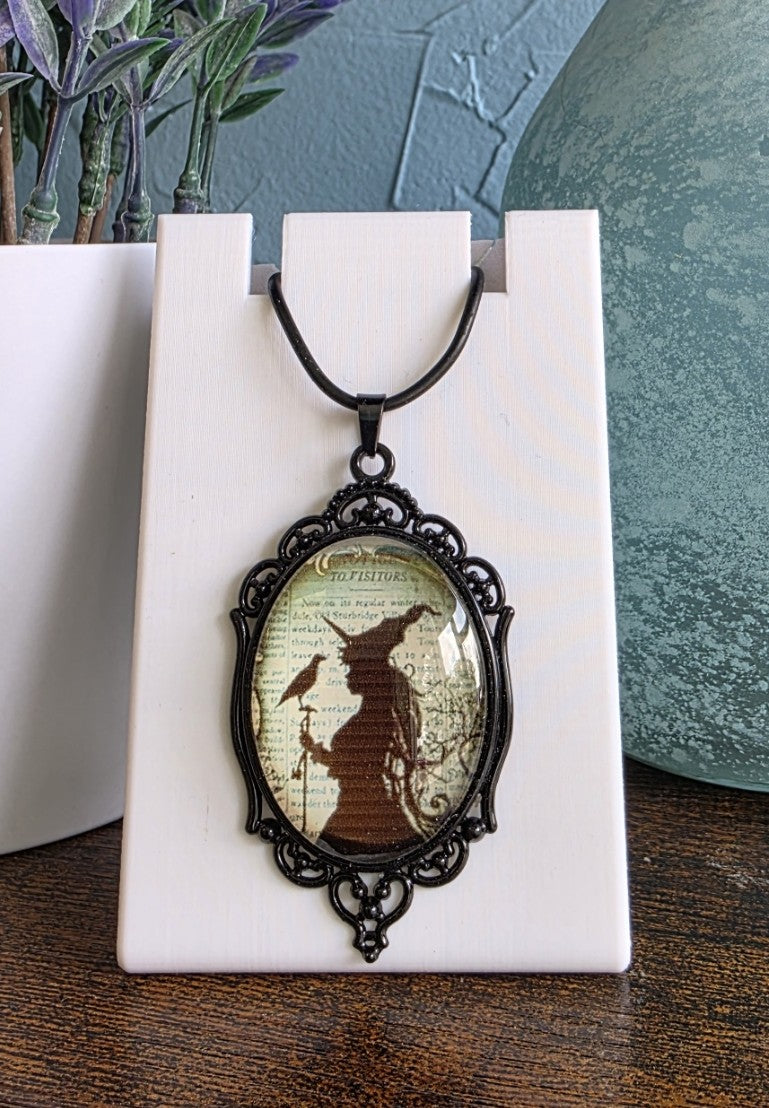 Antique cameo pendant necklace with witch and crow
