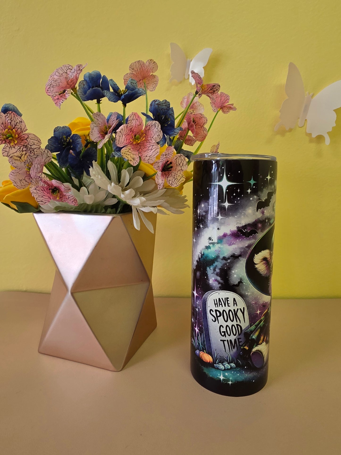 Stainless steel tumbler twenty ounces featuring a Halloween design with a cute highland baby cow image