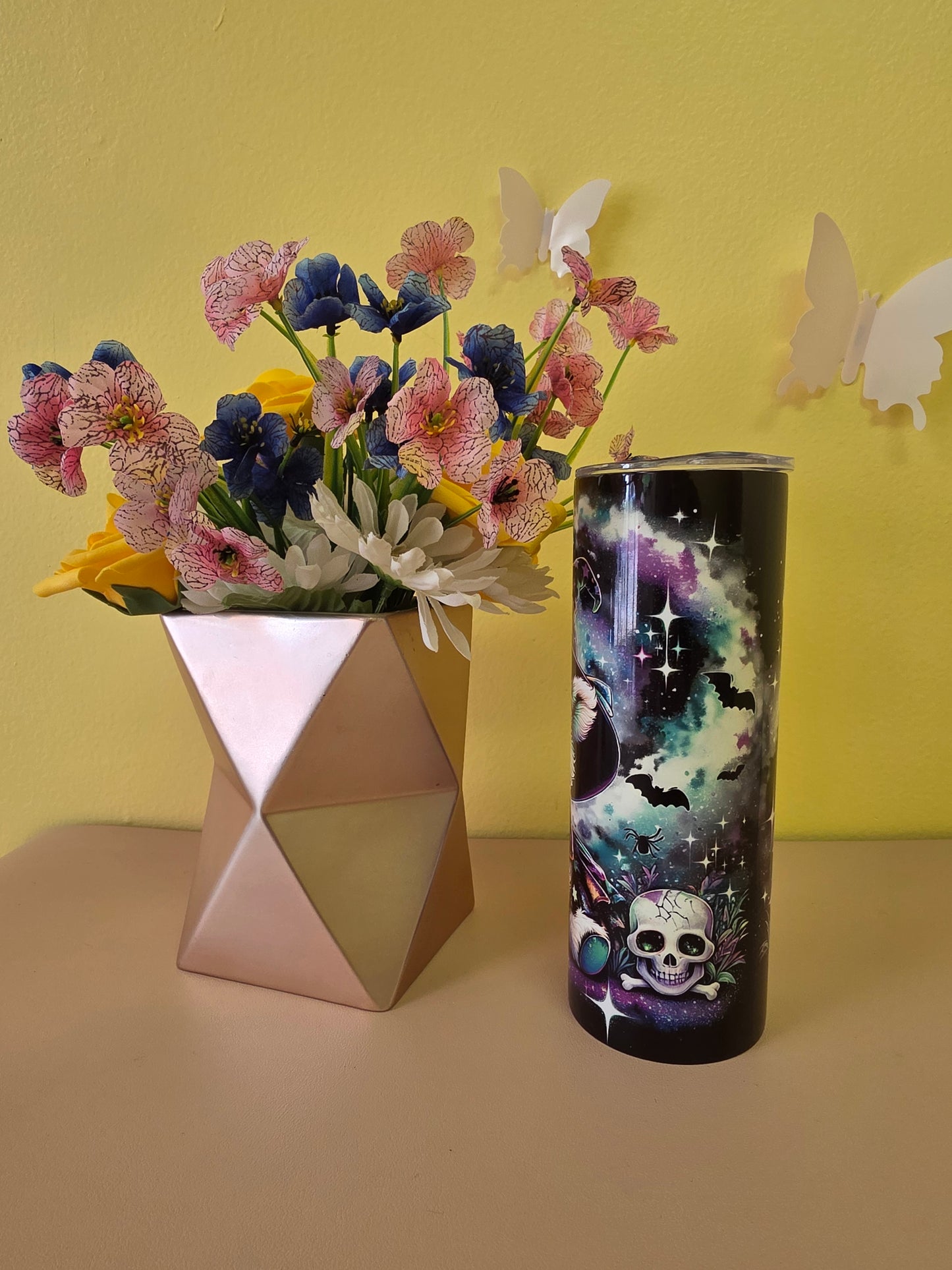 Stainless steel tumbler twenty ounces featuring a Halloween design with a cute highland baby cow image