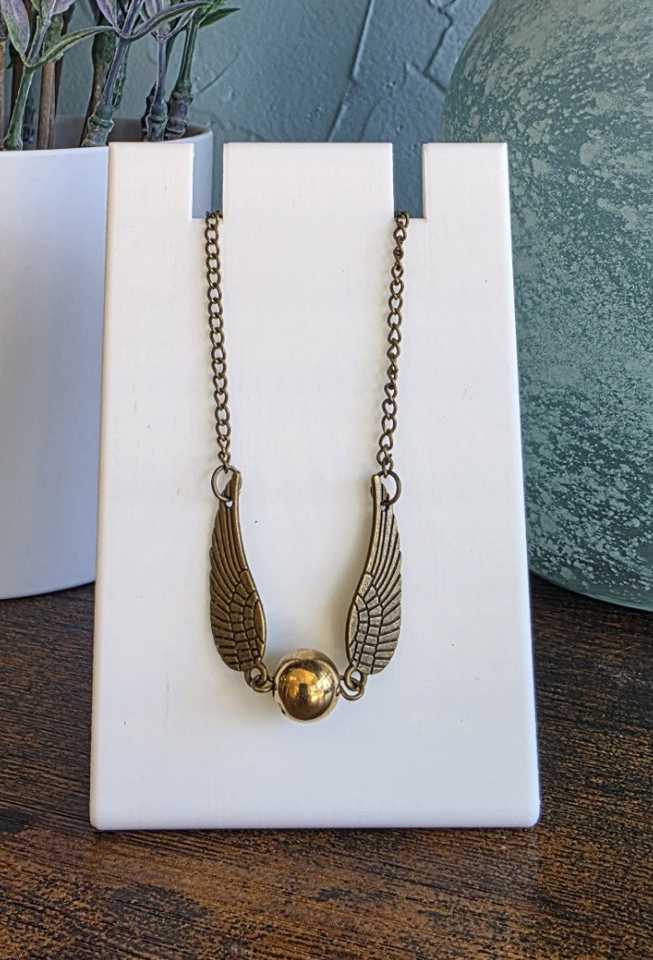 Harry Potter golden snitch bracelet in bronze finish.