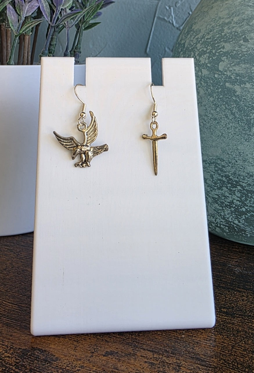Harry Potter silver mismatch earrings with Fawkes Phoenix and the Sword of Gryffindor.