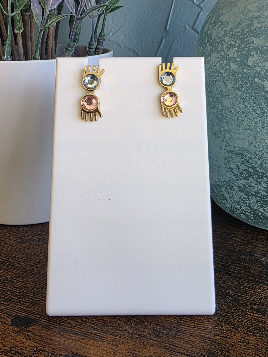 Harry Potter gold stud earrings of Luna Lovegood glasses with pink and blue stones.