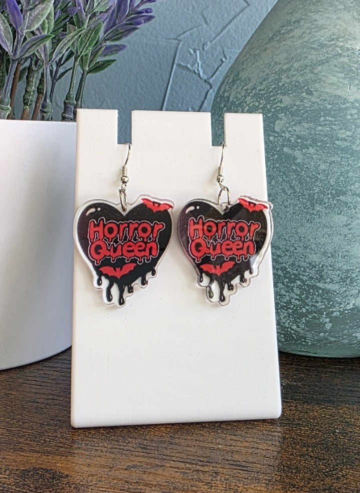 Heart-shaped earrings with 'Horror Queen' text gothic mystic horror
