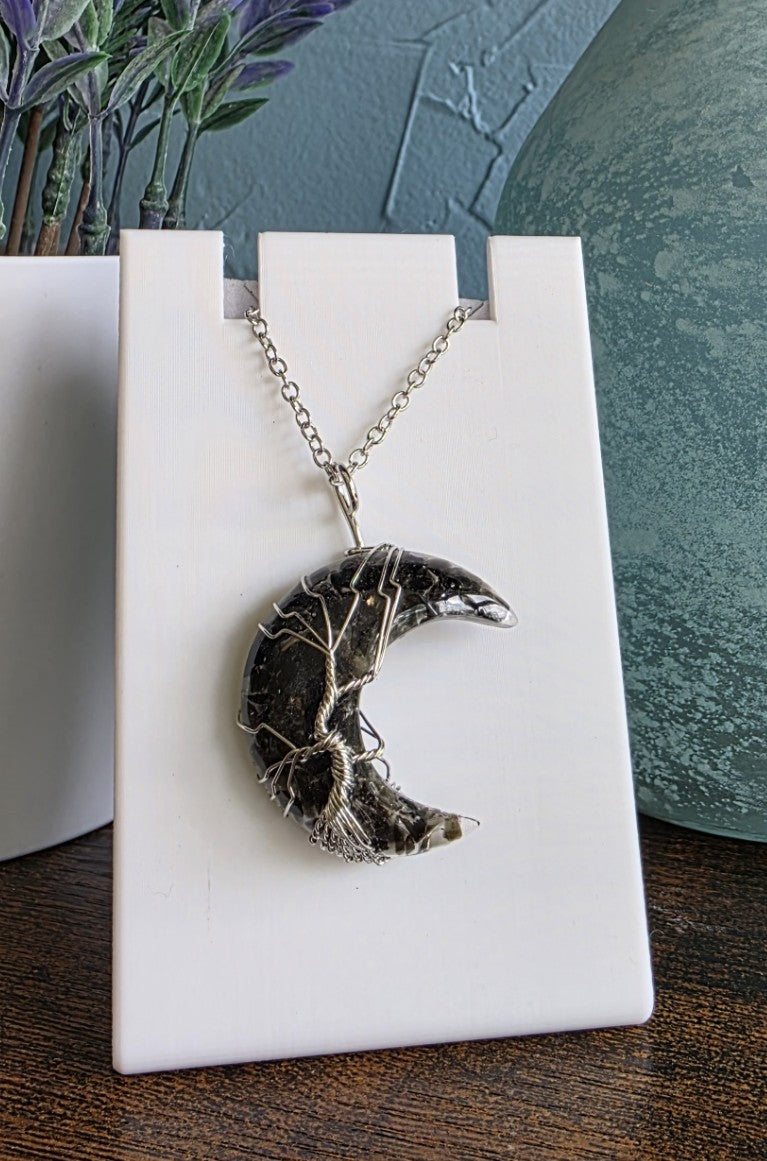 Moon-shaped pendant necklace with obsidian crystals