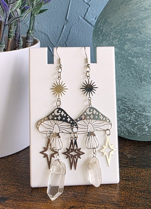 Silver celestial mushroom earrings with star and crystal dangles.