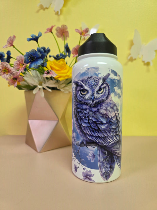 Water bottle with owl design on a yellow and beige background