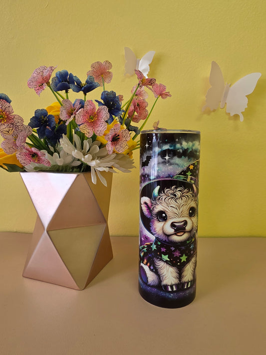 Stainless steel tumbler twenty ounces featuring a Halloween design with a cute highland baby cow image