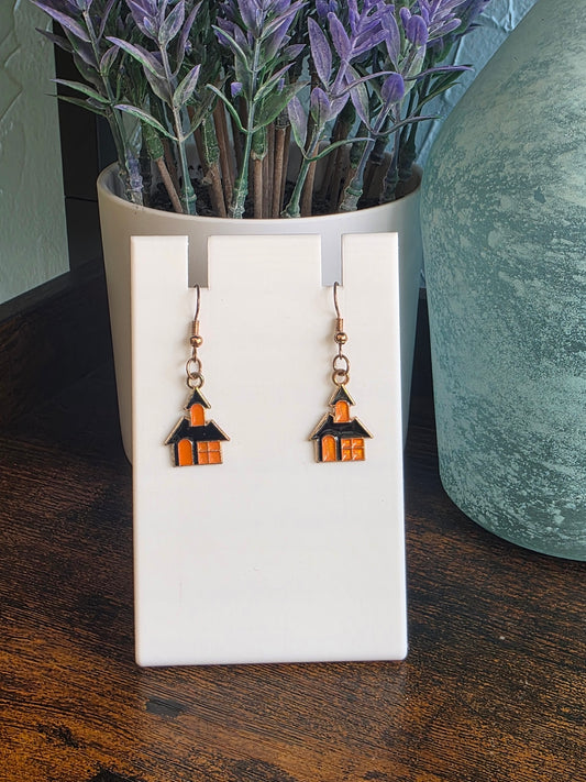 Pair of Halloween haunted house earrings. 