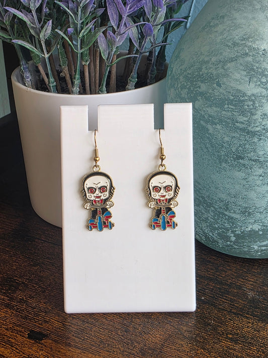Halloween earrings depicting Jigsaw character from Saw Movie