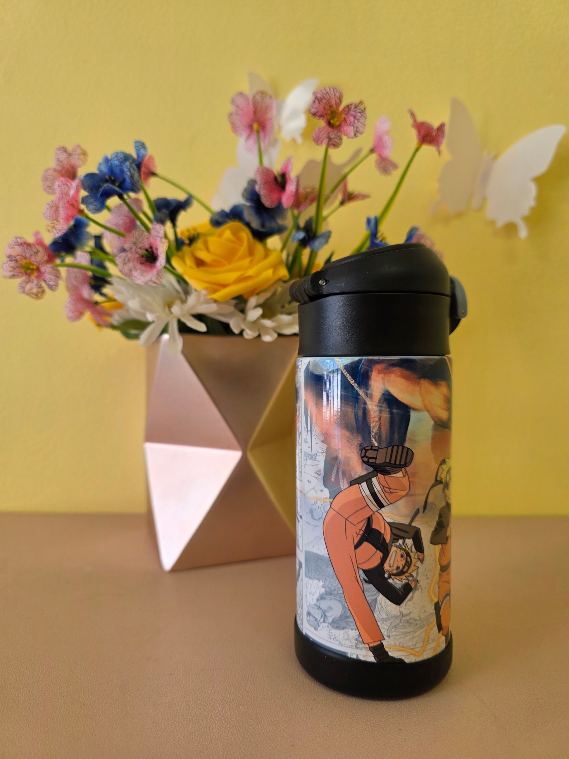 Naruto Stainless Steel tumbler on a table. 