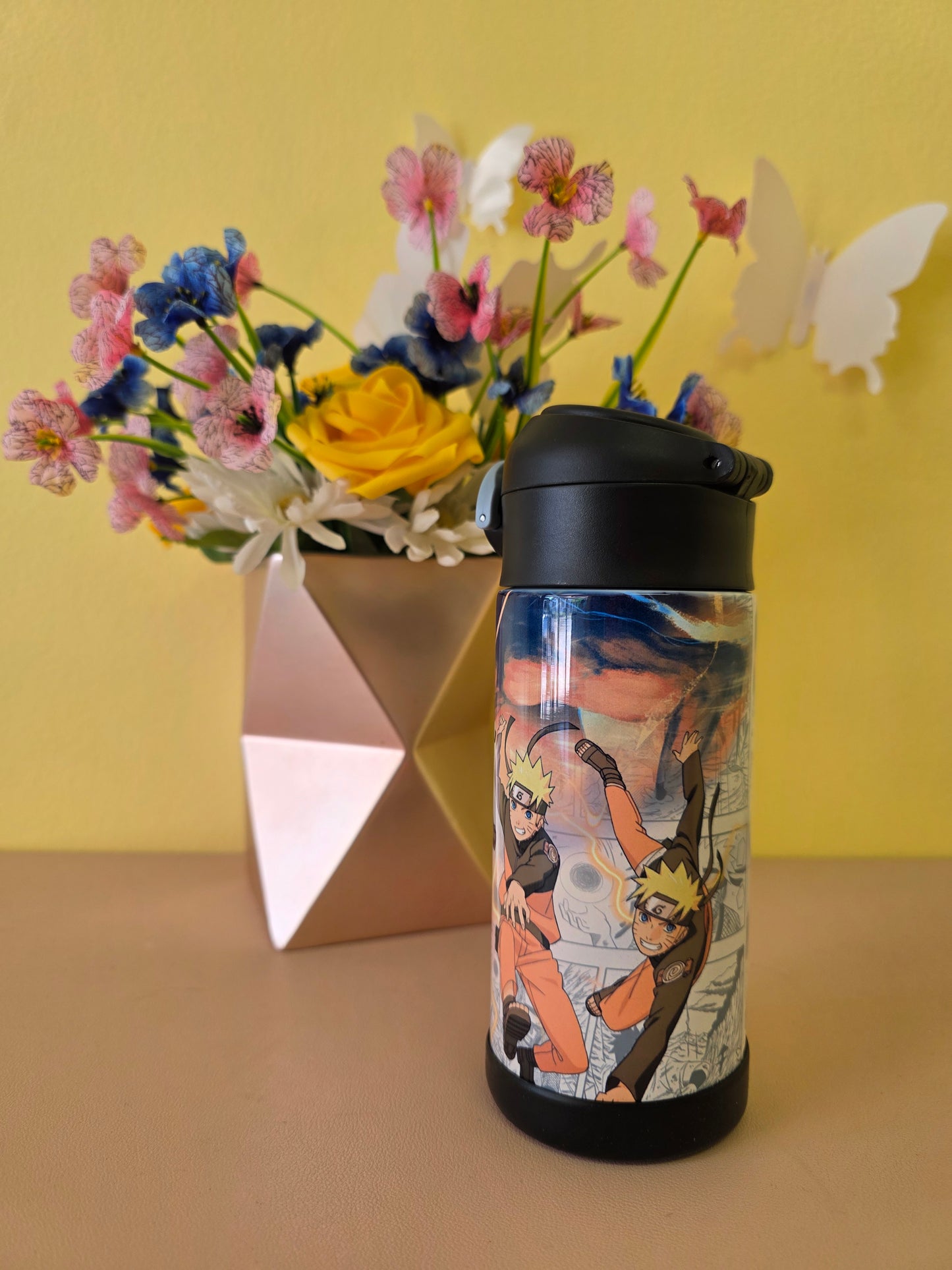 Naruto Stainless Steel tumbler on a table. 