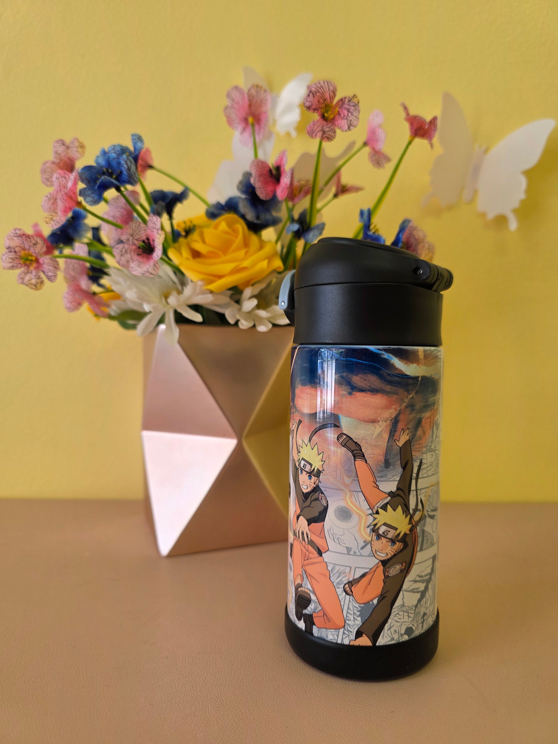 Naruto Stainless Steel tumbler on a table. 